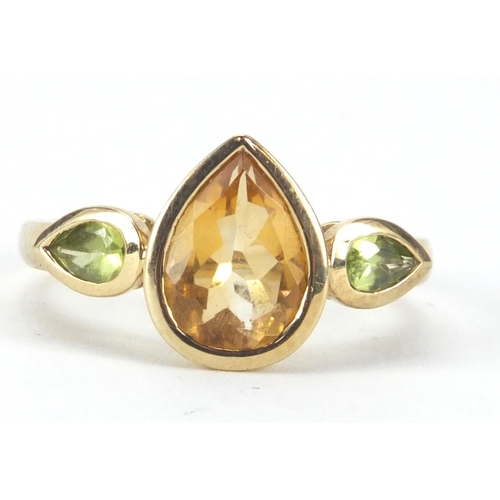 2604 - 9ct gold citrine and Peridot pendant on chain and matching ring, size N, approximate weight 7.4g