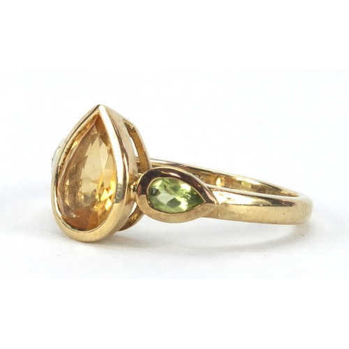 2604 - 9ct gold citrine and Peridot pendant on chain and matching ring, size N, approximate weight 7.4g