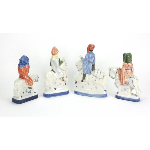 2251 - Four Rye pottery Canterbury Tales figures, each with factory marks to the base, the largest 25cm hig... 