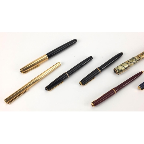 101 - Vintage fountain and ballpoint pens including Parker and a marbleised Valentine example with gold ni... 