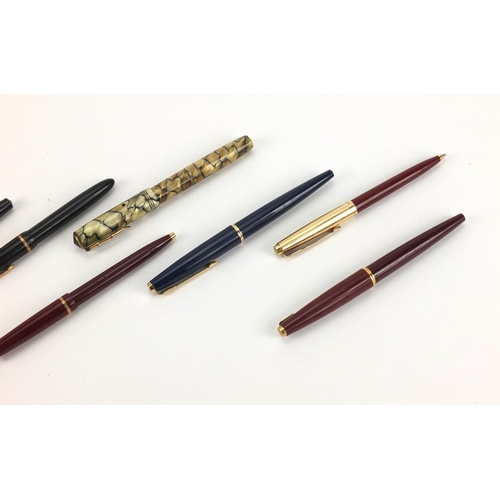 101 - Vintage fountain and ballpoint pens including Parker and a marbleised Valentine example with gold ni... 