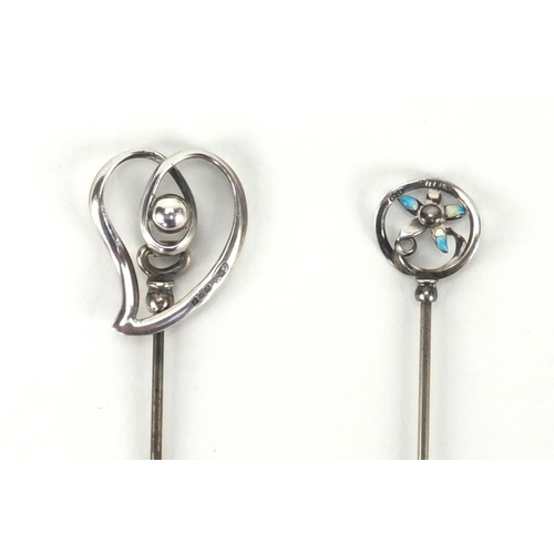 6 - Two Art Nouveau silver hat pins by Charles Horner, comprising a free moving love heart example and a... 