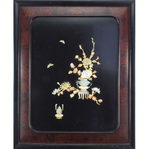 596 - Oriental lacquered panel inlaid with bone and Mother of Pearl, decorated with flowers and butterflie... 