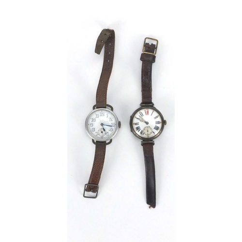 310 - Two Military interest trench watches including a silver example with luminous hands, both with leath... 