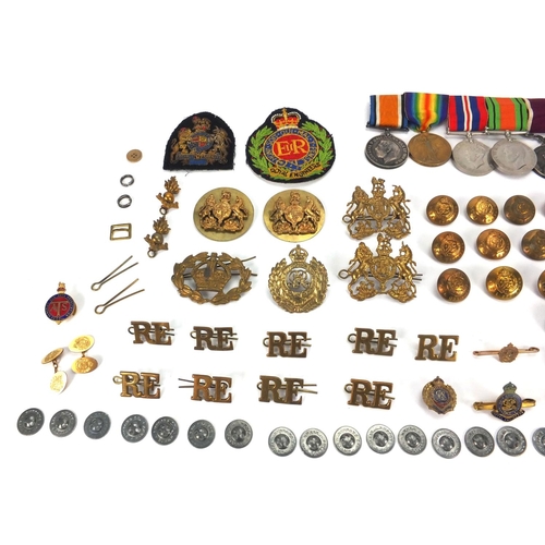 245 - British Military World War I and World War II medal group, with badges, pips and insignia, awarded t... 