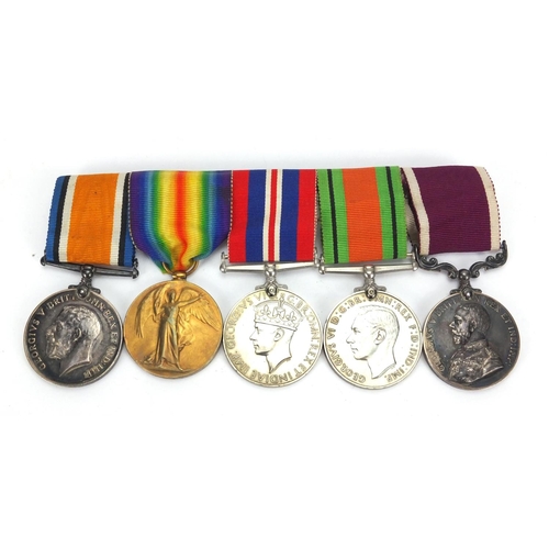 245 - British Military World War I and World War II medal group, with badges, pips and insignia, awarded t... 