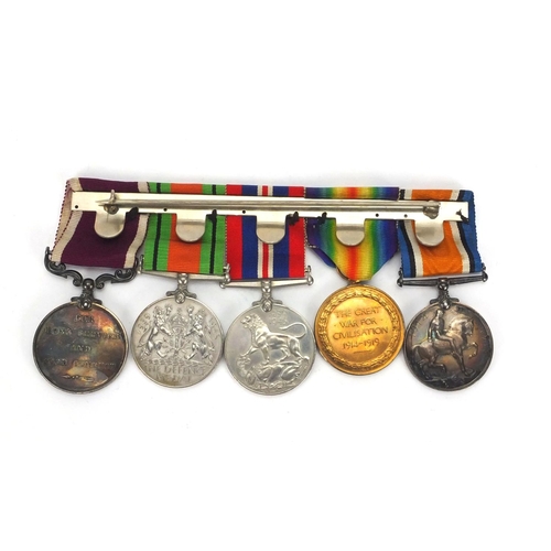 245 - British Military World War I and World War II medal group, with badges, pips and insignia, awarded t... 