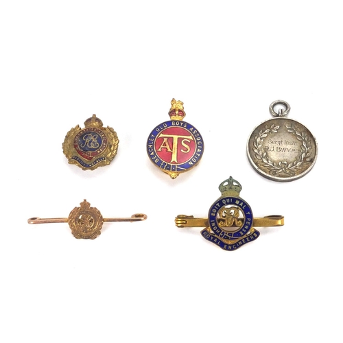 245 - British Military World War I and World War II medal group, with badges, pips and insignia, awarded t... 