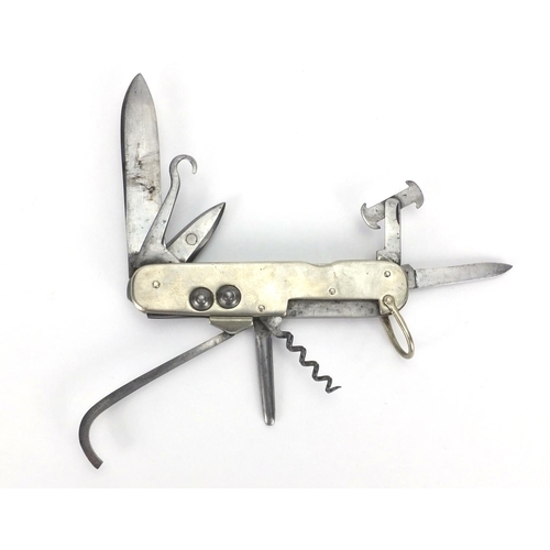 275 - J.C.Vickery Military interest multi tool engraved L H Thornton Rifle Brigade, 12.5cm wide