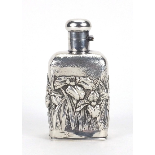 552 - Japanese silver flask, embossed with flowers, character marks to the base, 12cm high, approximate we... 