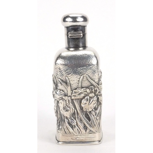 552 - Japanese silver flask, embossed with flowers, character marks to the base, 12cm high, approximate we... 