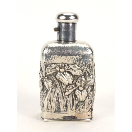 552 - Japanese silver flask, embossed with flowers, character marks to the base, 12cm high, approximate we... 