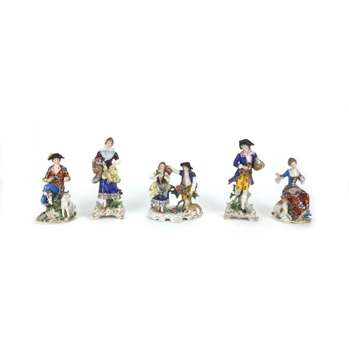 661 - Five continental hand painted porcelain figures including two pairs and a group of a young male and ... 