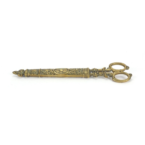 65 - Pair of 19th century brass seamstress scissors with brass sheath, embossed with floral motifs, 26.5c... 