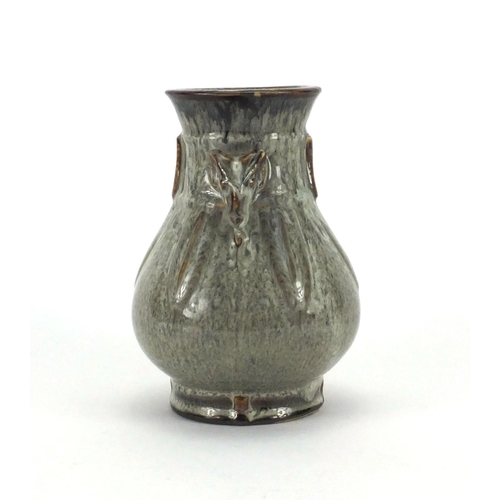 526 - Chinese mottled glazed vase with rams head handles, character marks to the base, 17cm high