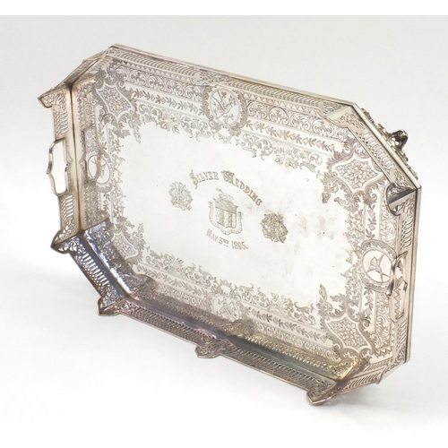 895 - Silver plated twin handled gallery tray profusely engraved with a floral boarder and panels of birds... 