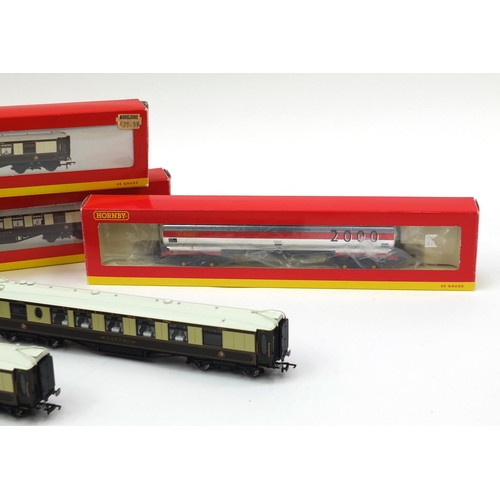 420 - Four Hornby OO gauge rolling stock, carriages and wagons comprising Hornby 2000, first class kitchen... 