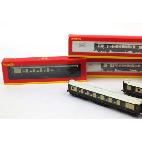 420 - Four Hornby OO gauge rolling stock, carriages and wagons comprising Hornby 2000, first class kitchen... 