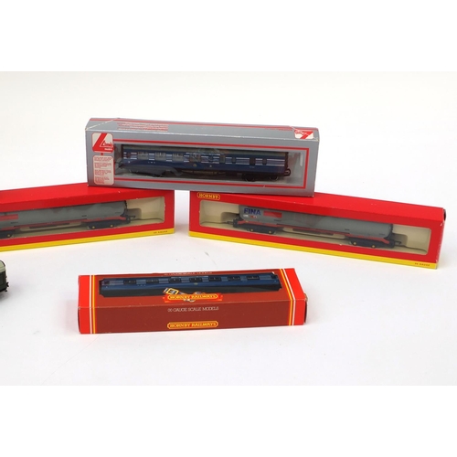 421 - Seven Hornby OO gauge rolling stock, wagons and carriages, including three LMS first class coach, Co... 