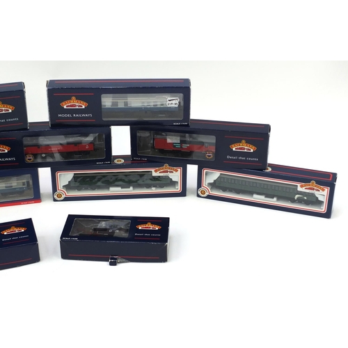 423 - Eleven Bachmann Branch-line OO gauge wagons and coaches including twenty five tonne Queen Mary brake... 