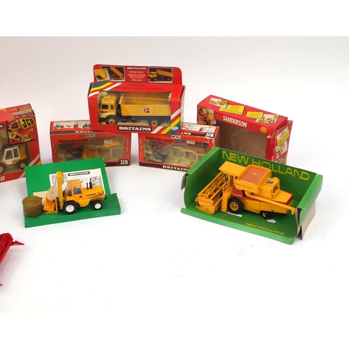 444 - Nine Britain's construction and agricultural vehicles and accessories, all boxed, including motorize... 