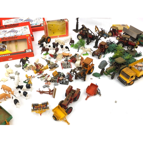 448 - Predominately Britain's and Ertl agricultural vehicles, accessories and lorries, including a Ferguso... 