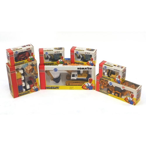 455 - Seven Joal compact construction vehicles, all boxed, including JCB site master, Komatsu excavator an... 