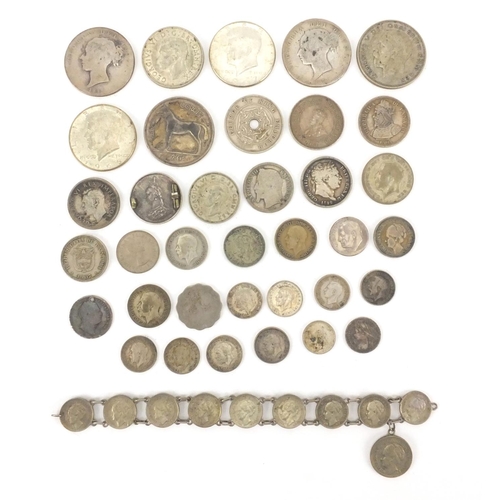 2583 - 19th century and later predominantly British coins including three penny bits, shillings and half do... 