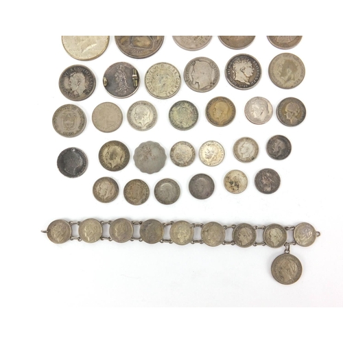 2583 - 19th century and later predominantly British coins including three penny bits, shillings and half do... 