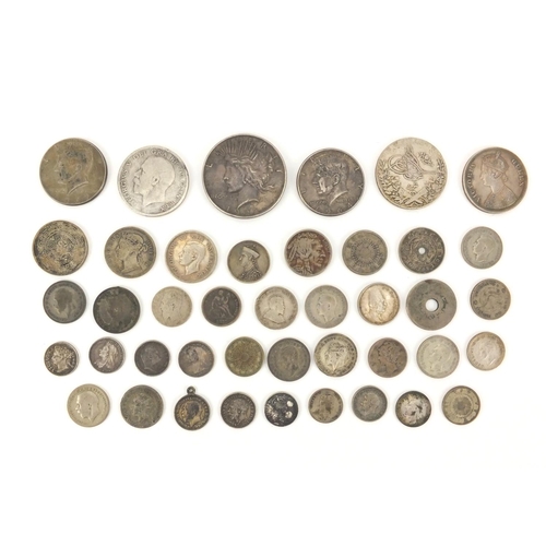 2586 - British and World coinage some silver including half crown, dollars and half dollars, approximate we... 