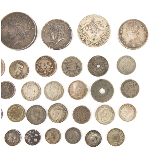 2586 - British and World coinage some silver including half crown, dollars and half dollars, approximate we... 