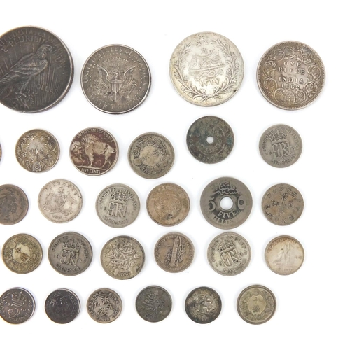 2586 - British and World coinage some silver including half crown, dollars and half dollars, approximate we... 