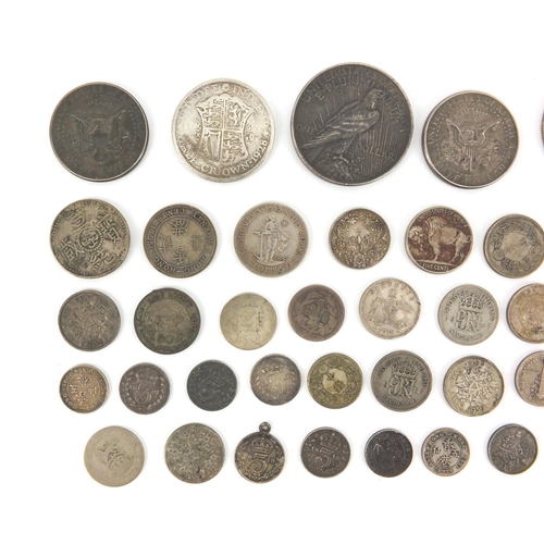 2586 - British and World coinage some silver including half crown, dollars and half dollars, approximate we... 