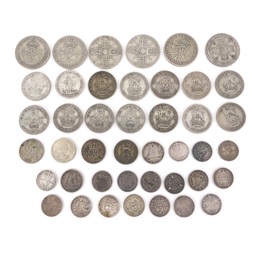 2595 - Victorian and later British coins some silver including four pence, shillings and florins, approxima... 