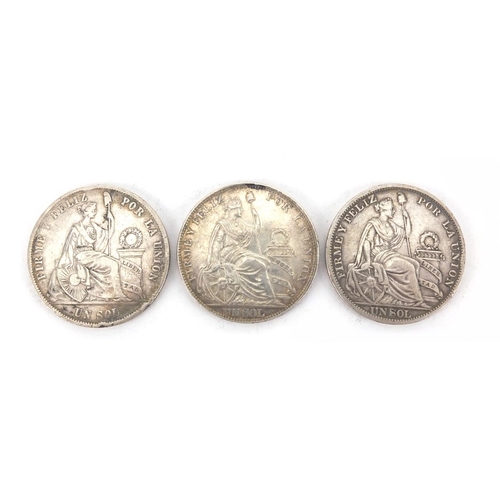 2596 - Three 19th century Peru one sol comprising dates 1871, 1894 and 1915, approximate weight 74.6g