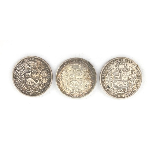 2596 - Three 19th century Peru one sol comprising dates 1871, 1894 and 1915, approximate weight 74.6g