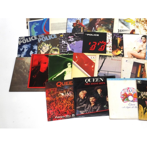 2848 - Rock vinyl LP records including Pink Floyd, Lou Reed, The Police, Prince and Queen examples