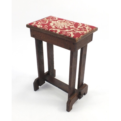 2088 - Arts & Crafts oak stool with red upholstered seat, 53cm high x 38cm wide x 23cm deep