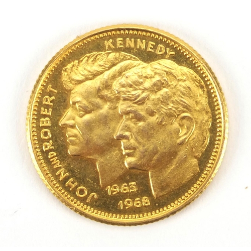 2601 - 1960's John and Robert Kennedy commemorative gold coin, approximate weight 6.1g