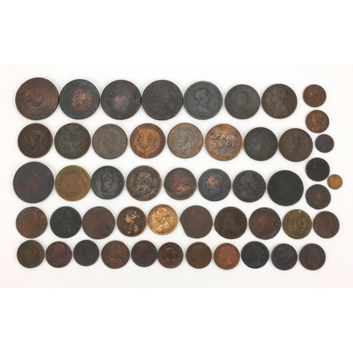 2599 - 18th century and later British coins and tokens including pennies and half pennies together with a o... 