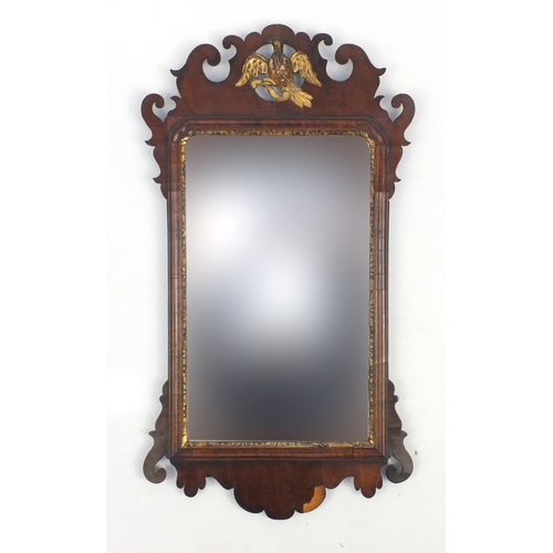 2007 - Georgian walnut mirror with gilded bird crest, 81cm x 45cm