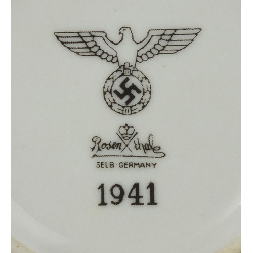 301 - German Military interest ceramic tableware and chamber pot, each with factory marks to the bases, th... 