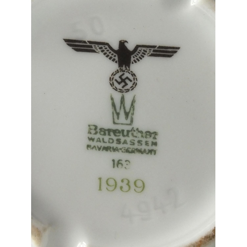 301 - German Military interest ceramic tableware and chamber pot, each with factory marks to the bases, th... 