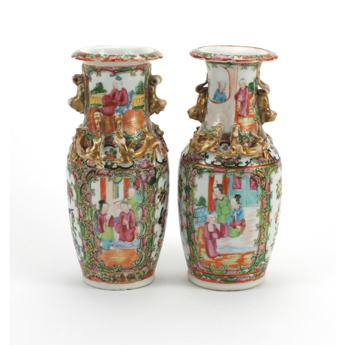 477 - Pair of Chinese Canton porcelain vases, both with Foo Dog handles and relief water dragon decoration... 