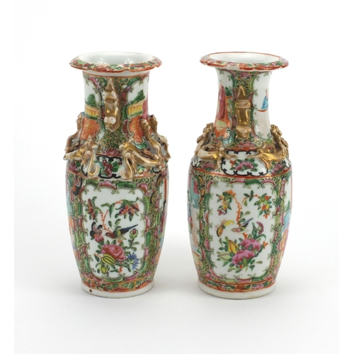 477 - Pair of Chinese Canton porcelain vases, both with Foo Dog handles and relief water dragon decoration... 