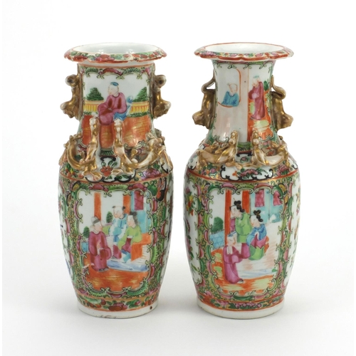 477 - Pair of Chinese Canton porcelain vases, both with Foo Dog handles and relief water dragon decoration... 