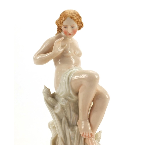 685 - Victorian hand painted centre piece, with a semi nude maiden on a naturalistic shell base with a liz... 