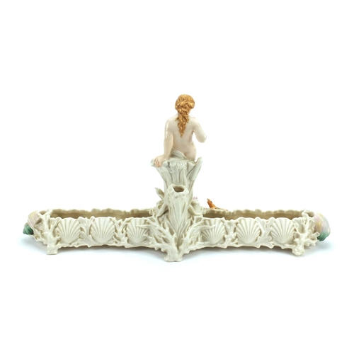 685 - Victorian hand painted centre piece, with a semi nude maiden on a naturalistic shell base with a liz... 