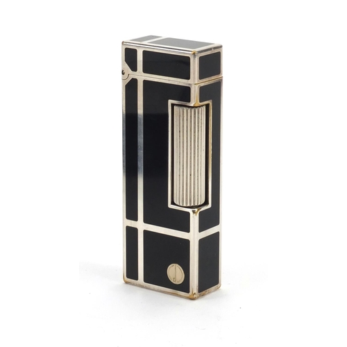 89 - Dunhill black enamelled pocket lighter with fitted case, repair guarantees and service invoice, the ... 