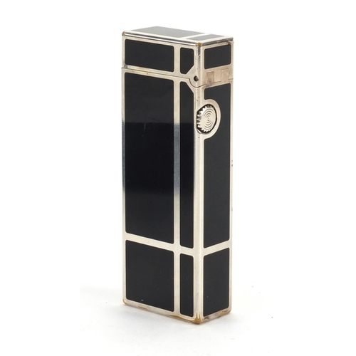 89 - Dunhill black enamelled pocket lighter with fitted case, repair guarantees and service invoice, the ... 